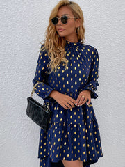 Robe à pois à manches longues et volants 