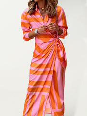 Bedrucktes Kleid mit Laternenärmeln, Bindeband und Reversschlitz, kontrastfarbener, mittellanger Rock 