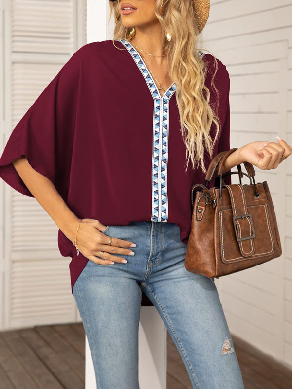 Damen-Chiffonbluse mit Dolmanärmeln, V-Ausschnitt und kurzen Ärmeln 