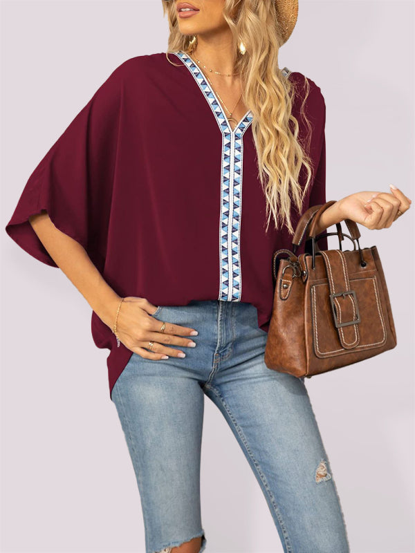 Damen-Chiffonbluse mit Dolmanärmeln, V-Ausschnitt und kurzen Ärmeln 