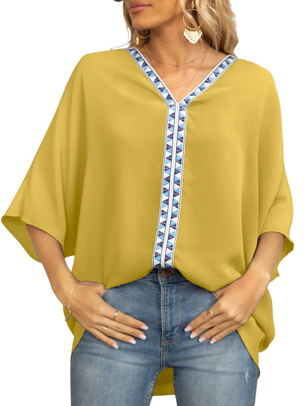 Damen-Chiffonbluse mit Dolmanärmeln, V-Ausschnitt und kurzen Ärmeln 