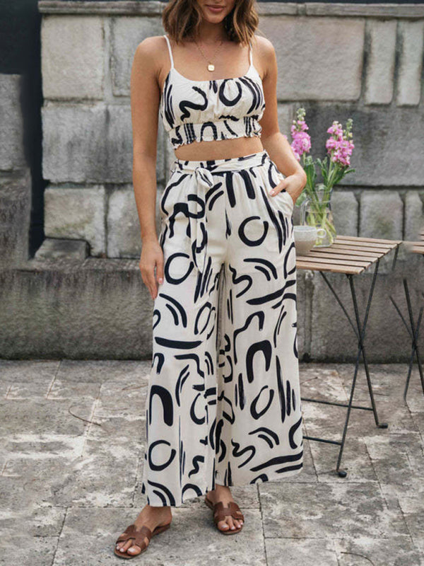 Zweiteiliges Set aus bedrucktem, ärmellosem Trägertop und langer, weit geschnittener Hose für Damen 