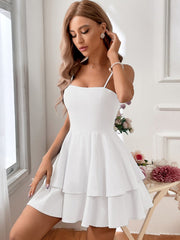 Robe courte sexy à bretelles et nœud papillon dos nu 