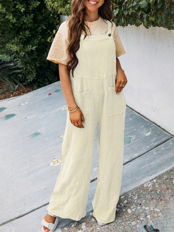 Neuer lässiger Jumpsuit in Unifarbe mit Taschen, gefaltetem Kragen und lockeren Hosenträgern 