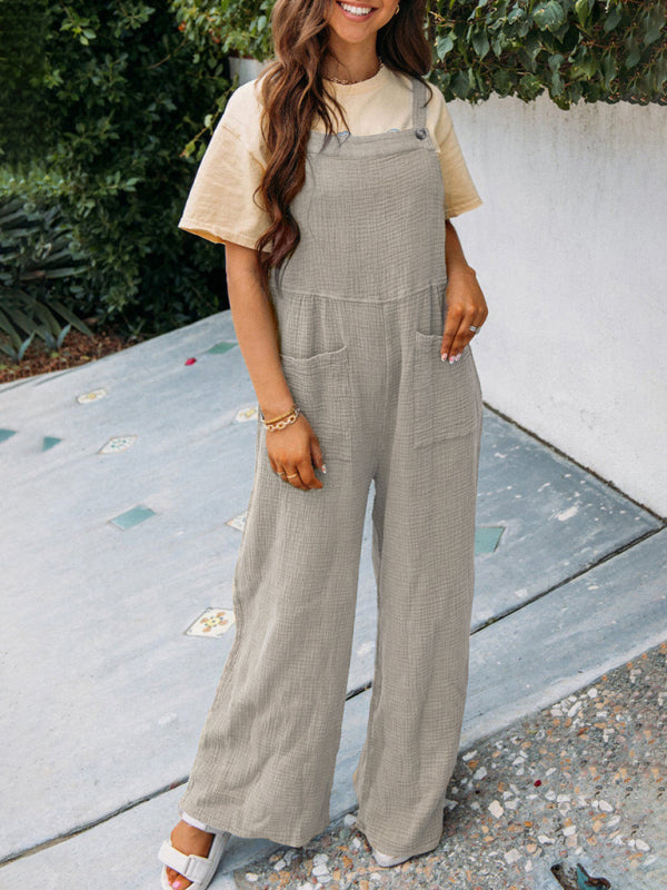Neuer lässiger Jumpsuit in Unifarbe mit Taschen, gefaltetem Kragen und lockeren Hosenträgern 