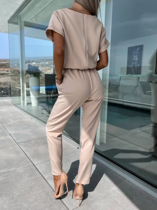 Kurzärmeliger Jumpsuit mit V-Ausschnitt, Eingrifftasche, elastischem Bund und Bindebändern, Bleistifthose und kurzem Schnitt 