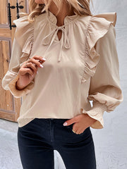 Damenbluse mit Rüschen und Bindeband, langärmelig 