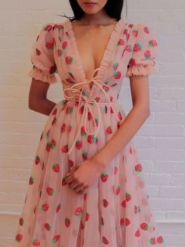 Pink strawberry sequined dress with tie-waist closure – detail view