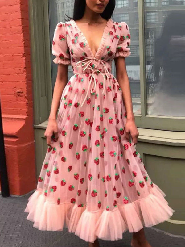 Women's strawberry print pink sequined midi dress with puffed sleeves – front view