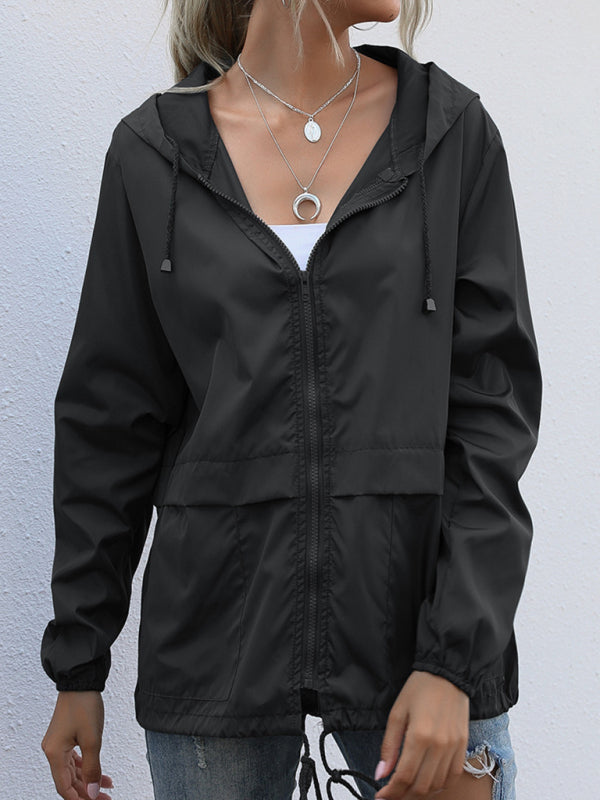 Neue leichte Damen-Regenjacke mit Reißverschluss und Kapuze, ideal für Outdoor-Aktivitäten wie Wandern. 