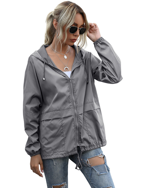 Neue leichte Damen-Regenjacke mit Reißverschluss und Kapuze, ideal für Outdoor-Aktivitäten wie Wandern. 