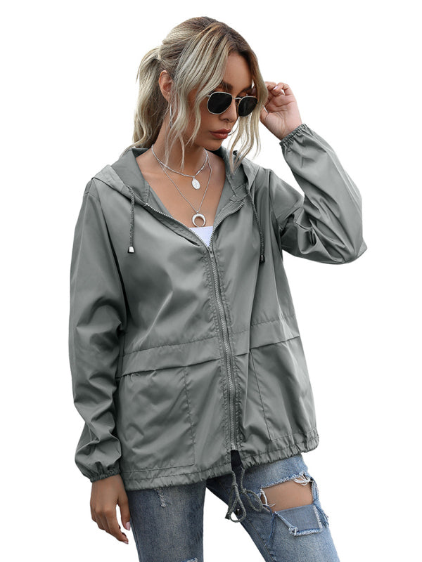 Neue leichte Damen-Regenjacke mit Reißverschluss und Kapuze, ideal für Outdoor-Aktivitäten wie Wandern. 
