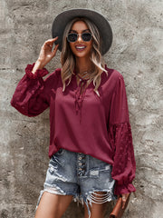 Elegante Damenbluse mit Stehkragen und Puffärmeln aus Spitze 