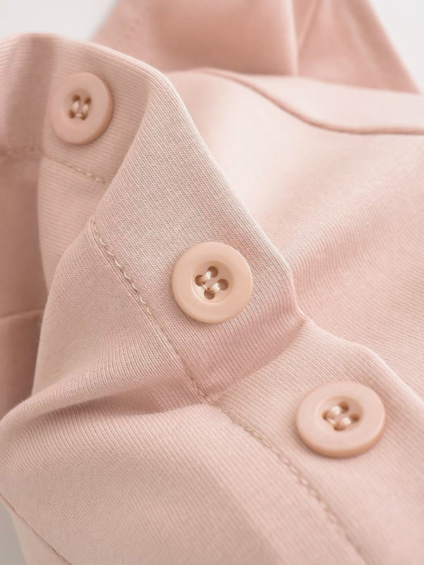 Breitkrempiger Neckholder-Rock mit hoher Taille, mehreren Knöpfen und Stretch-Rock 
