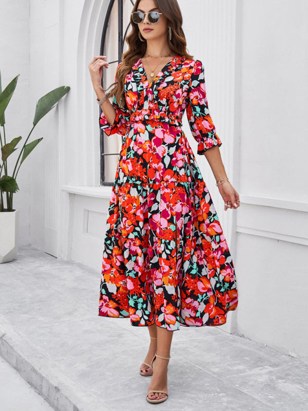 Neues lässiges Urlaubskleid mit Print, V-Ausschnitt und Schlitz für Frühling und Sommer 