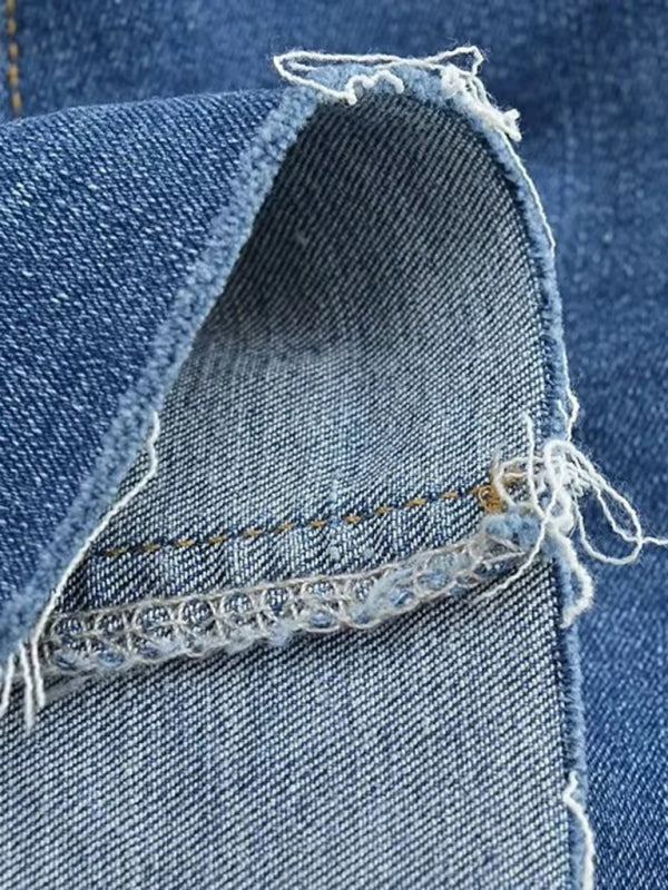 Heißer, hochtaillierter, elastischer, hüftbedeckender, figurbetonter A-Linien-Jeansrock mit offener Kante und blickdichtem Saum. 