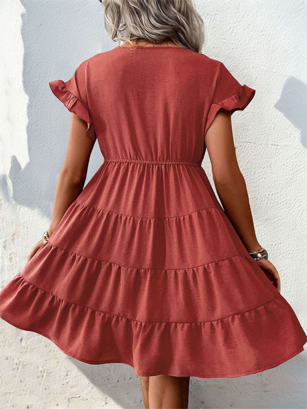 Damenkleid mit V-Ausschnitt, Raglanärmeln und einfarbigem Design 