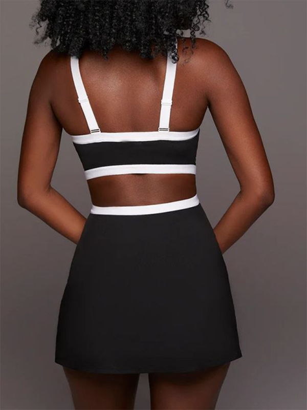 Neues, farblich kontrastierendes, schlichtes, blickdichtes und bequemes Yoga- und Tennis-Kleid für Damen mit Gürtel. 