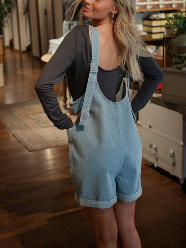 Denim washed workwear double pocket loose jumpsuit – side view