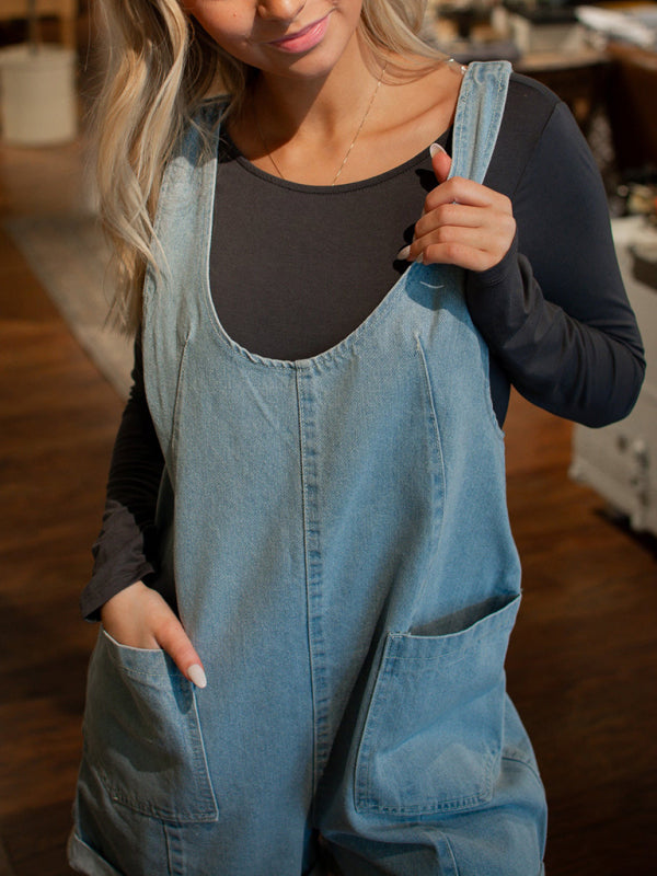 Denim washed workwear double pocket loose jumpsuit – back view
