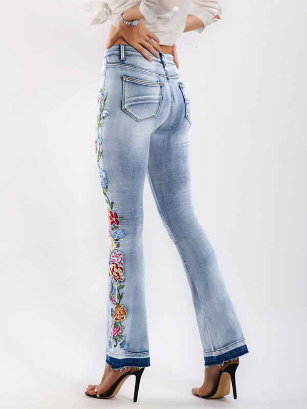 Schlaghose aus Denim mit Blumenstickerei 