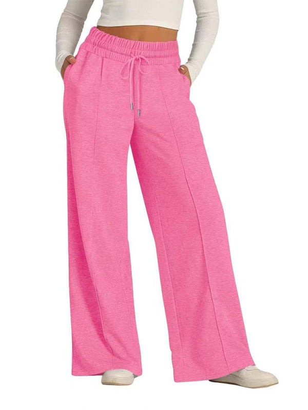 Women's pink wide-leg joggers with drawstring – front view