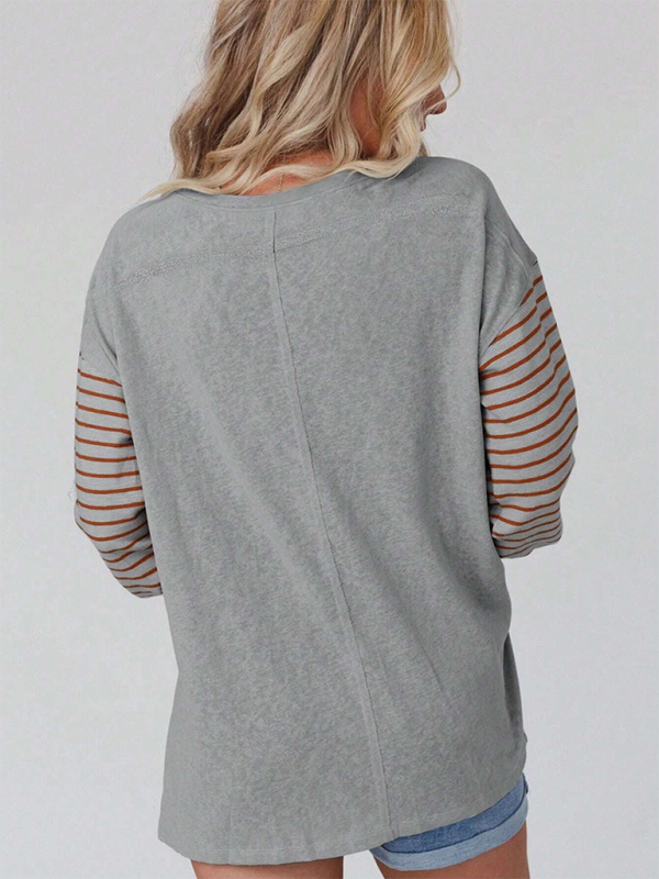 Neues, lässiges Langarm-T-Shirt mit Rundhalsausschnitt und Streifenmuster in verschiedenen Farben. 