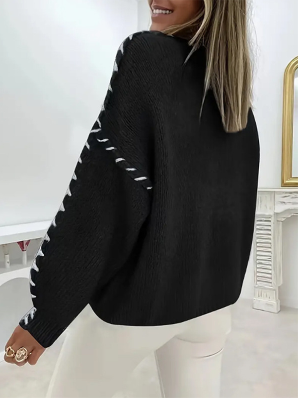 Pull-over femme uni à col rond, manches longues et cordon de serrage, coupe ample, en maille. 