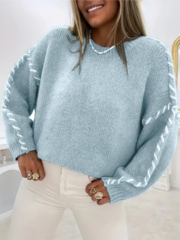 Pull-over femme uni à col rond, manches longues et cordon de serrage, coupe ample, en maille. 