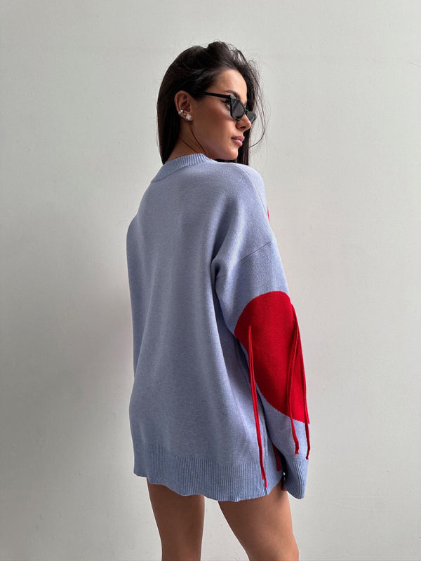 Neuer modischer Pullover mit Rundhalsausschnitt und Herzquasten