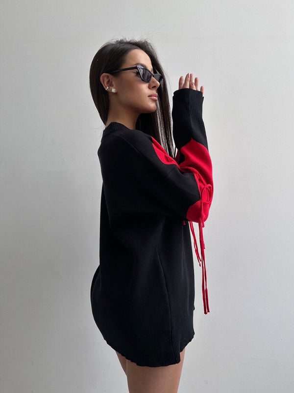 Neuer modischer Pullover mit Rundhalsausschnitt und Herzquasten