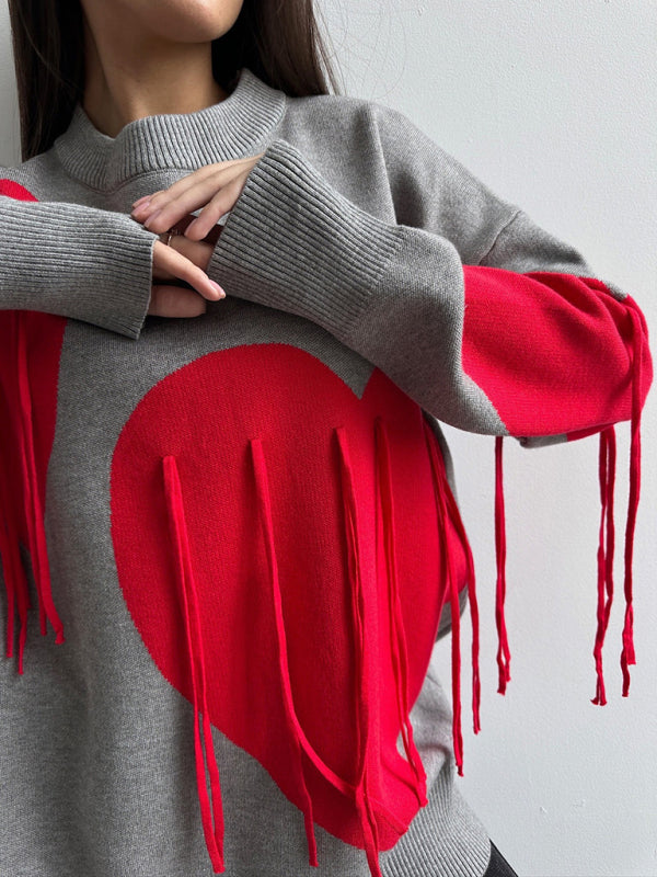 Neuer modischer Pullover mit Rundhalsausschnitt und Herzquasten