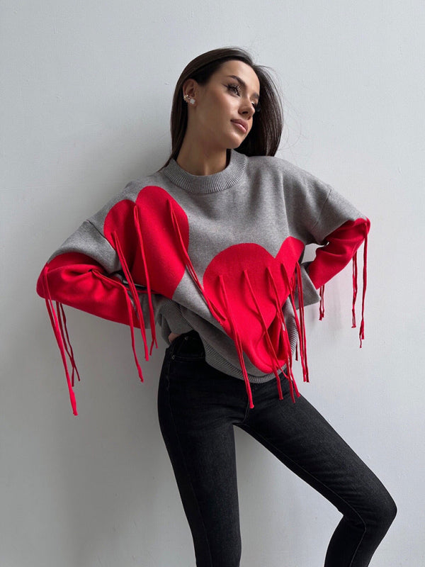 Neuer modischer Pullover mit Rundhalsausschnitt und Herzquasten