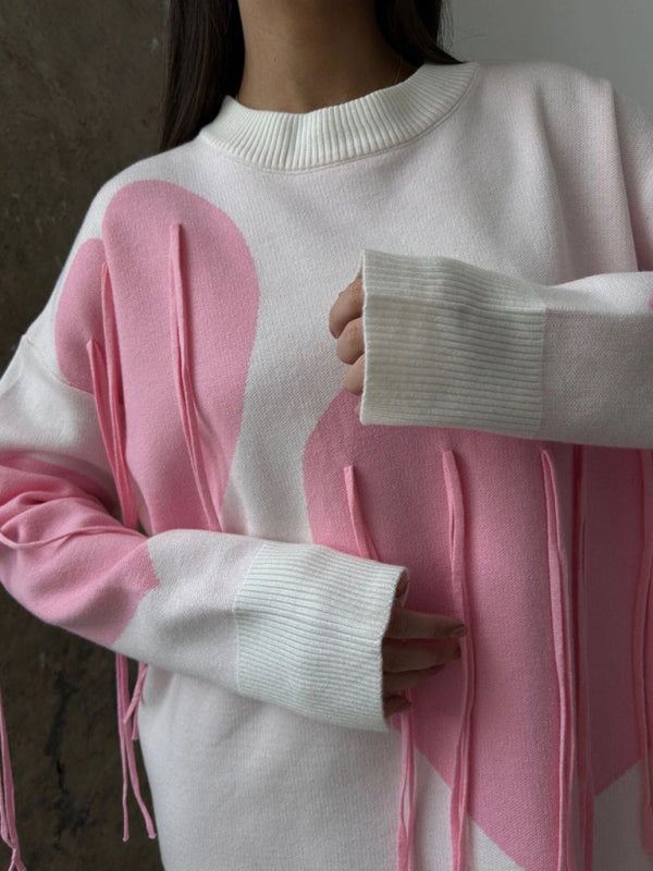 Neuer modischer Pullover mit Rundhalsausschnitt und Herzquasten