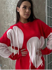Neuer modischer Pullover mit Rundhalsausschnitt und Herzquasten