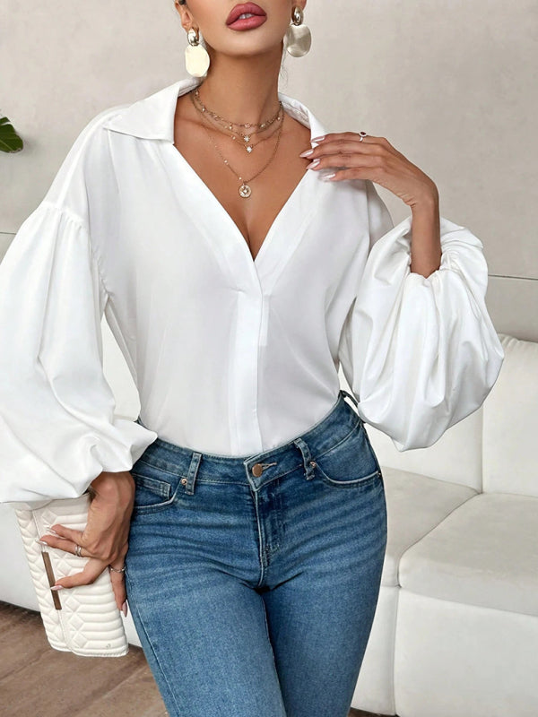 Long-fitting, puff-sleeved top with a semi-open collar – detail view