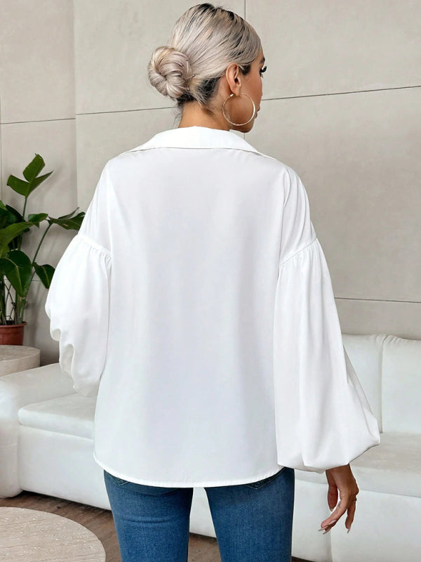 Long-fitting, puff-sleeved top with a semi-open collar – back view