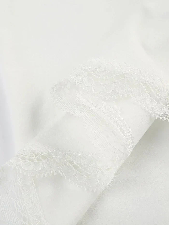 LACE-TRIMMED TOP WITH VINTAGE BOW LACE DESIGN