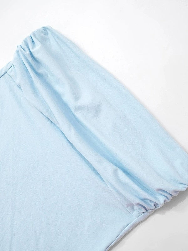 LIGHT BLUE STRAPLESS TOP WITH PLAYFUL SLANTED HEM