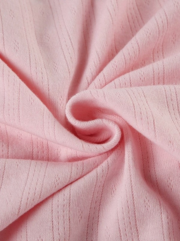 LONG-SLEEVED TOP WITH RUFFLED BUST IN SOFT KNIT FABRIC