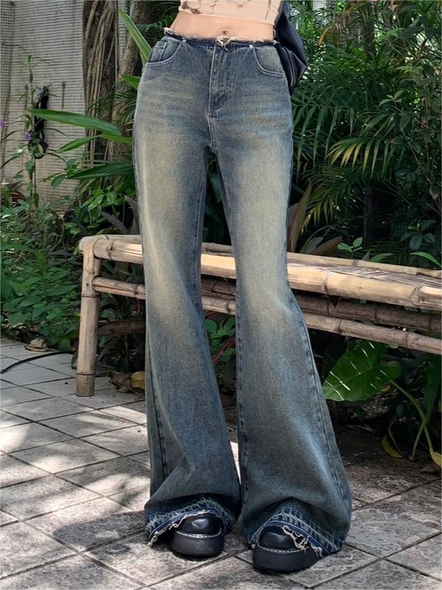 LOW-RISE DISTRESSED FLARED JEANS COTTON BLEND WIDE LEG