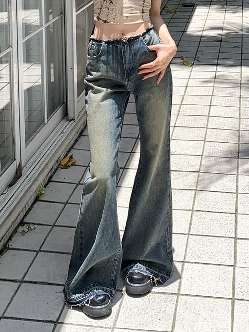 LOW-RISE DISTRESSED FLARED JEANS COTTON BLEND WIDE LEG