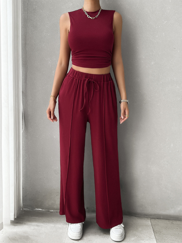 Burgundy two-piece outfit featuring a casual round neck sleeveless top and trousers with comfortable fit