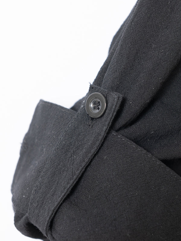 Black buttoned sleeve detail from New Fashion Retro Stand Collar Slim Fit Casual Shirt
