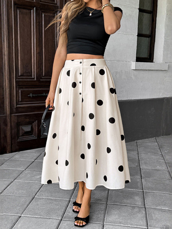 Polka-dot midi skirt with elastic waist, retro A-line style, in a product display