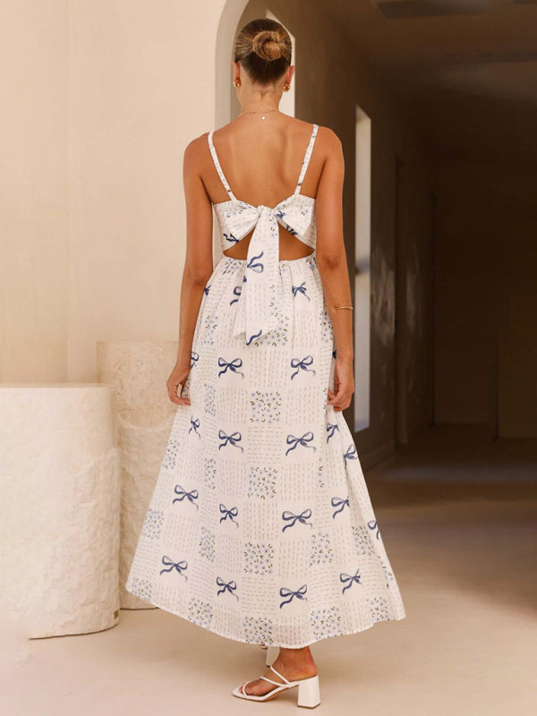 White bow-patterned dress with back tie and V-neck waist, ideal for holidays