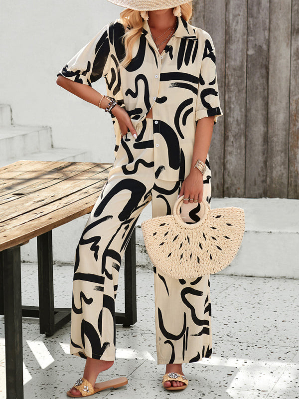 Woman wearing printed lapel short-sleeve shirt and trousers vacation suit for casual fashion
