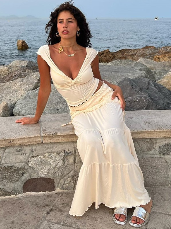 New women’s sexy navel-baring low-cut short vest + pleated skirt two-piece set