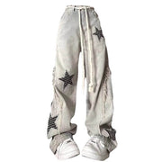 OVERSIZED DENIM JEANS WITH BOLD STAR PATCHES FOR CONTEMPORARY STREETWEAR