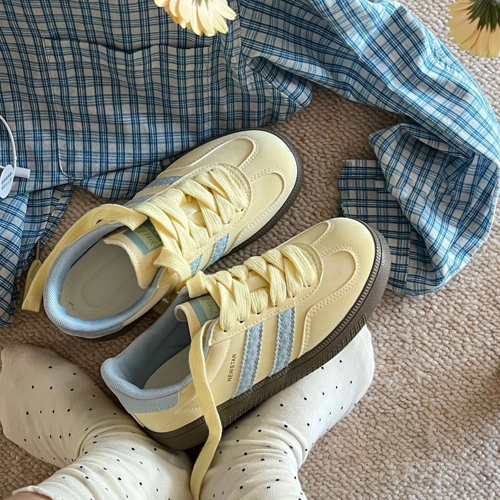 PASTEL YELLOW SNEAKERS WITH LIGHT BLUE ACCENTS